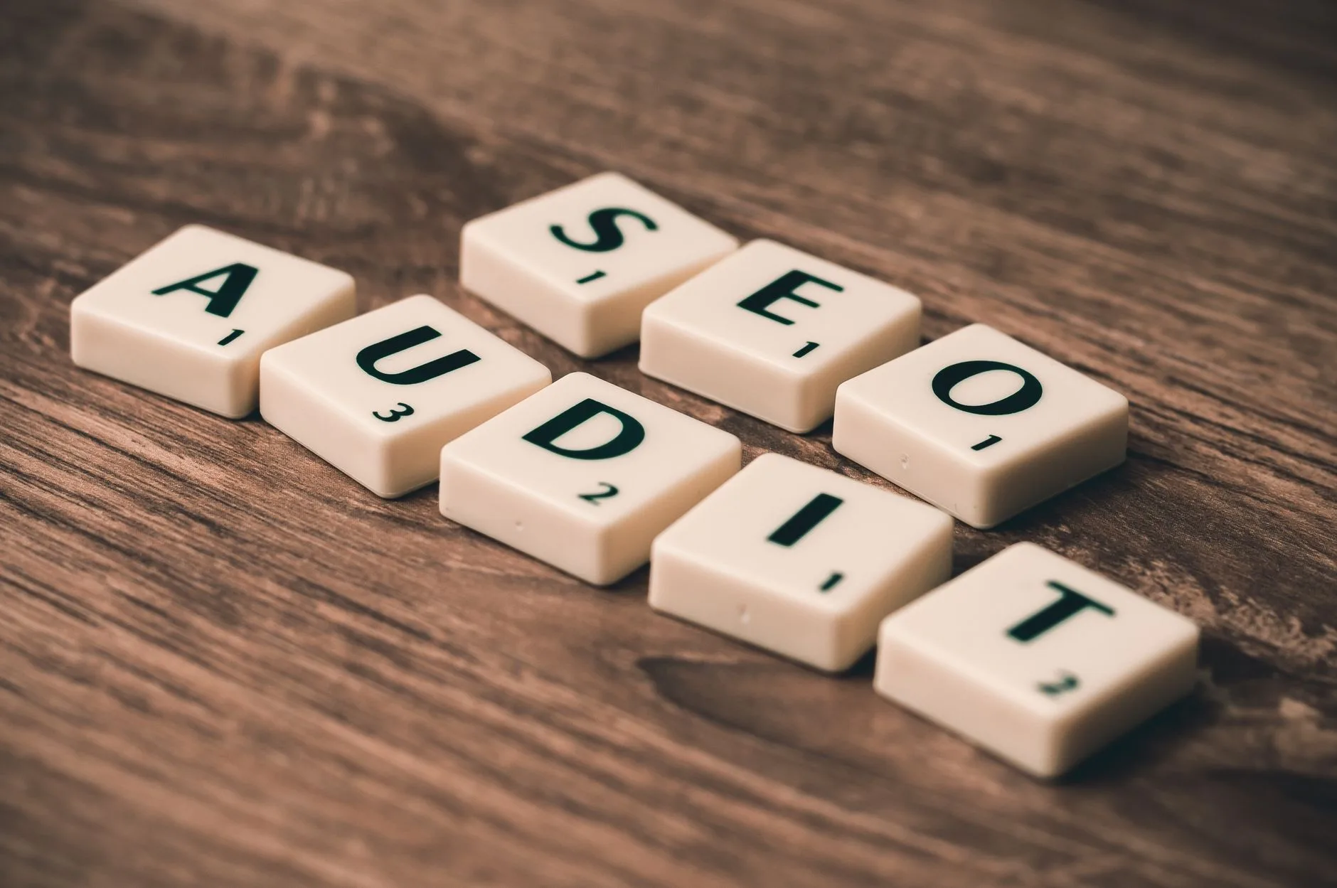 SEO audit spelled out in Scrabble tiles